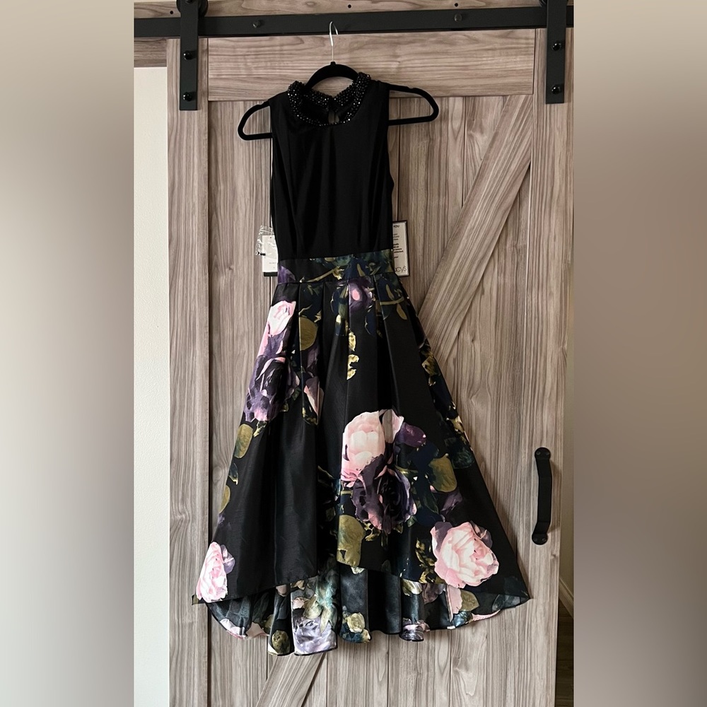 Gorgeous brand new dress. Tags on. Perfect for evening out or wedding.